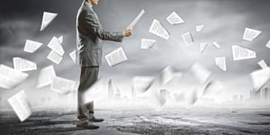 Businessman examining document in hands. Signing contract-1